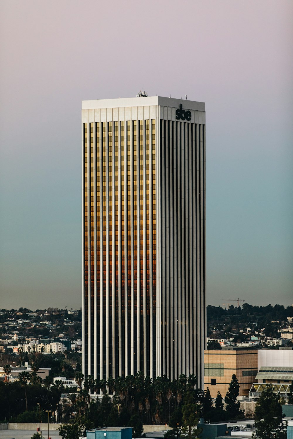 white high-rise building during sunset