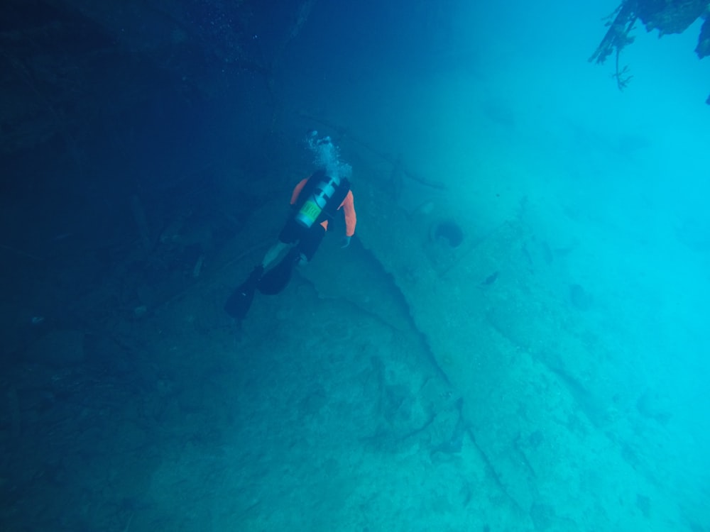 man diving in water