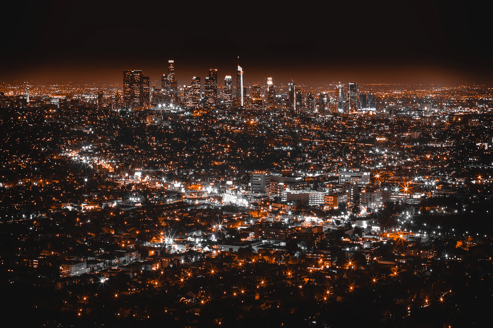 A city grid lit at night seen from above
