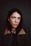 portrait photograph of woman in gray and brown coat
