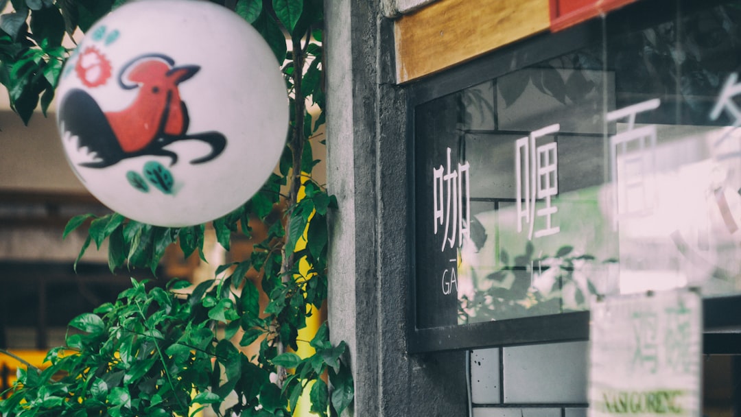 green leafed plant beside grey concrete post, Chinese Restaurant