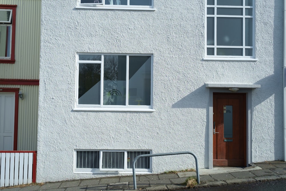 white wooden framed glass window