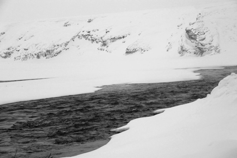 river near ice land at daytime