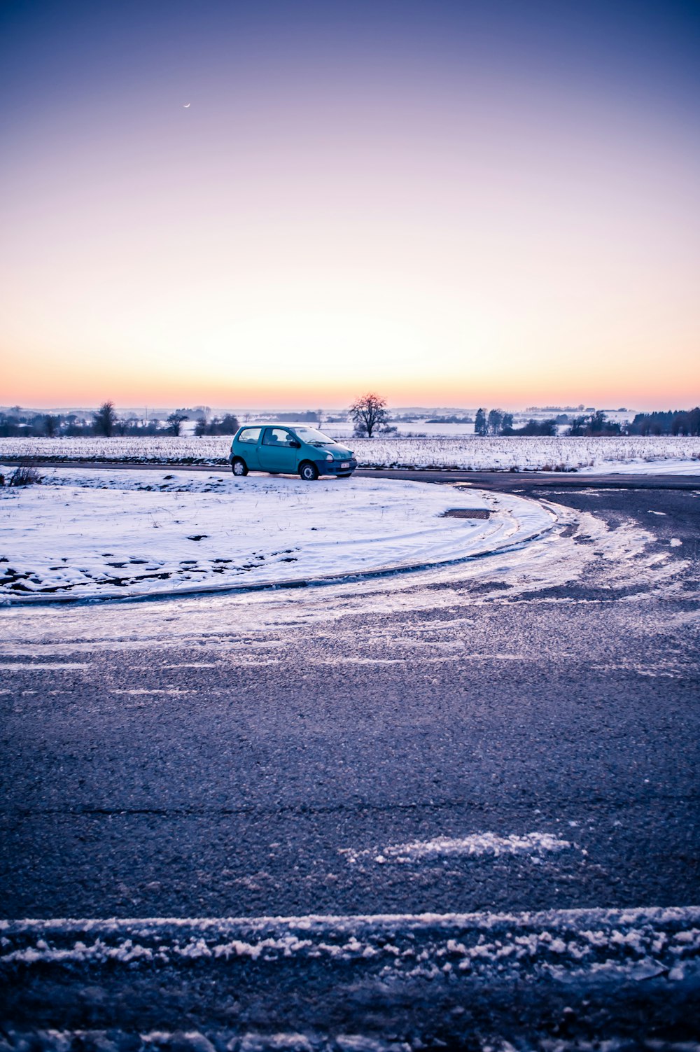 green vehicle on road