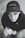 A young person gazes upward while holding a cup. They are wearing a black cap with the word 'YOUTH' on it and a dark hoodie. The image is in black and white, contributing to a nostalgic or contemplative atmosphere.