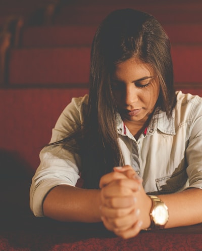 praying woman inside church