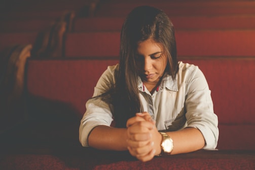 praying woman inside church