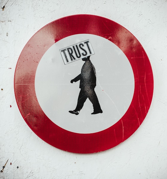 round red and white Trust signage