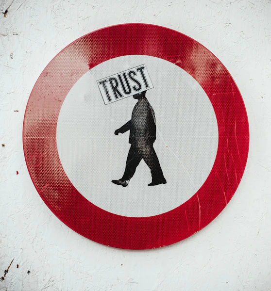 round red and white Trust signage