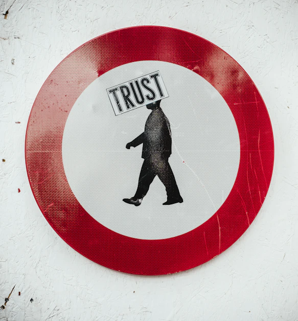 round red and white Trust signage