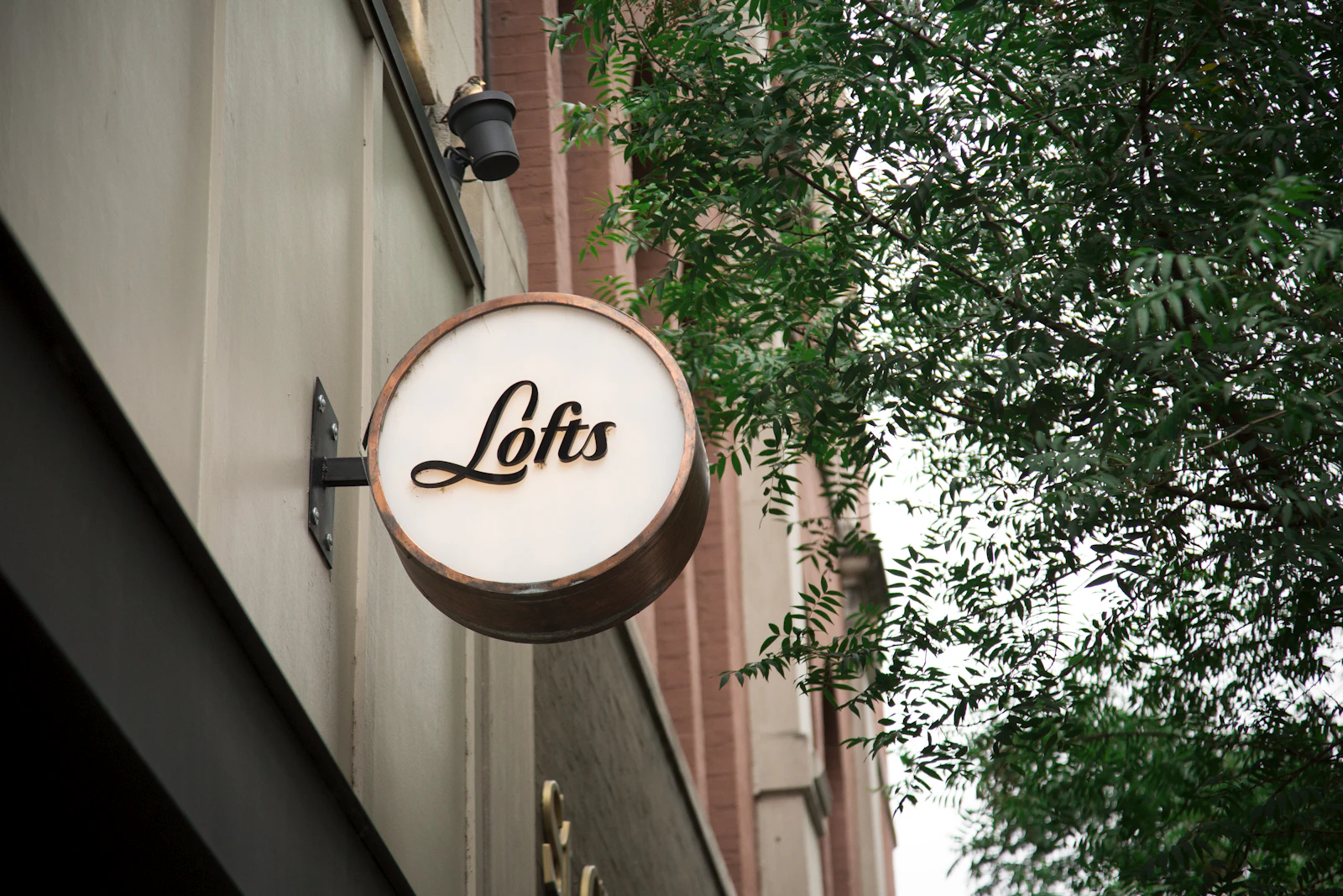 Illuminated signage mounted on a commercial building