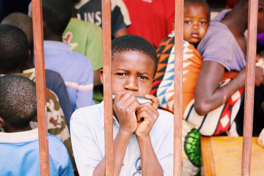 boy playing harmonica