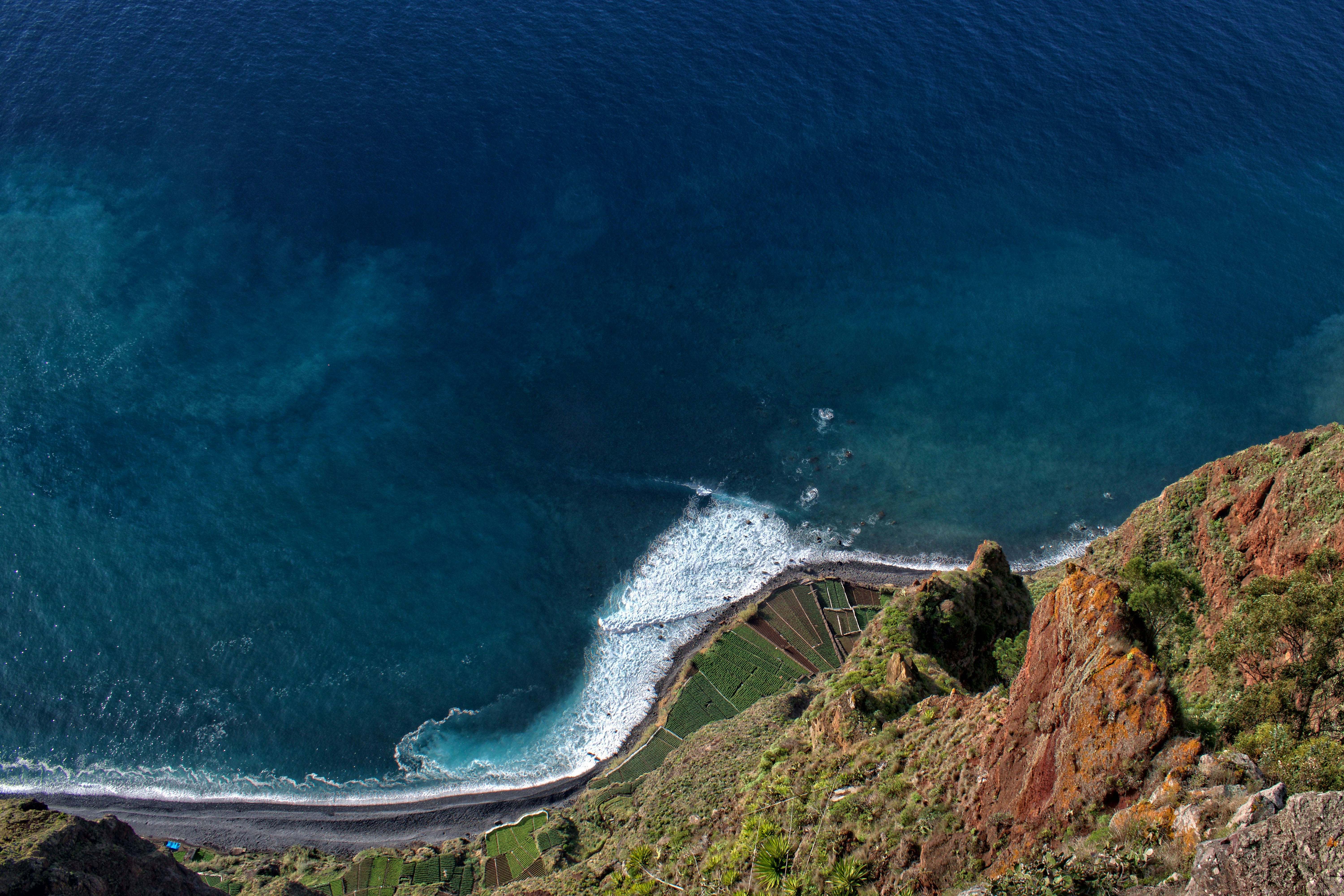 aerial photo of body of water, Clifftop view on Madeira’s western coast