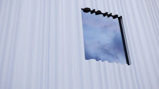 Detailed view of CNC-cut EPS window surrounds with a thin, protective exterior coating highlighting texture and precision.