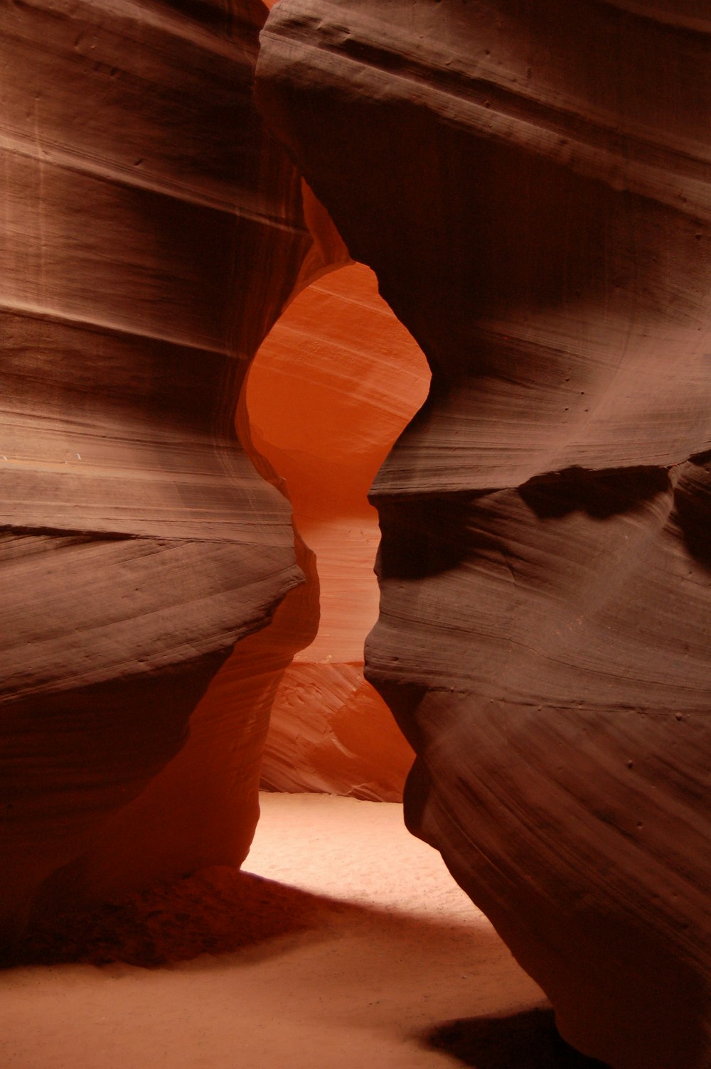 a narrow slot in the side of a canyon