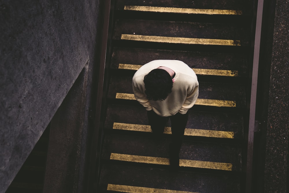 man walking on staircase