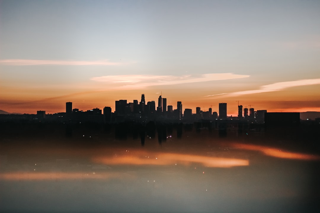 cityscape of high-rise building during golden hour,