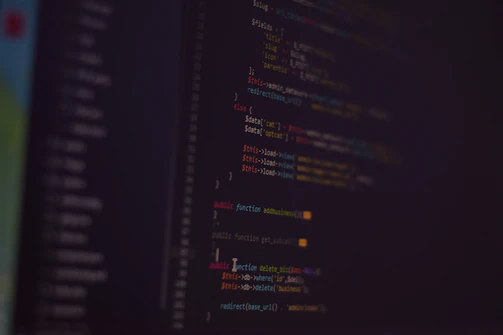 A stack of popular software packages neatly arranged against a black coding-style background.