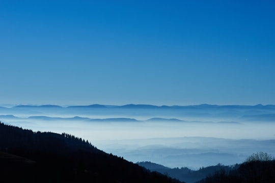 silhouette of mountain under clear blue sky in Rickenbach Germany