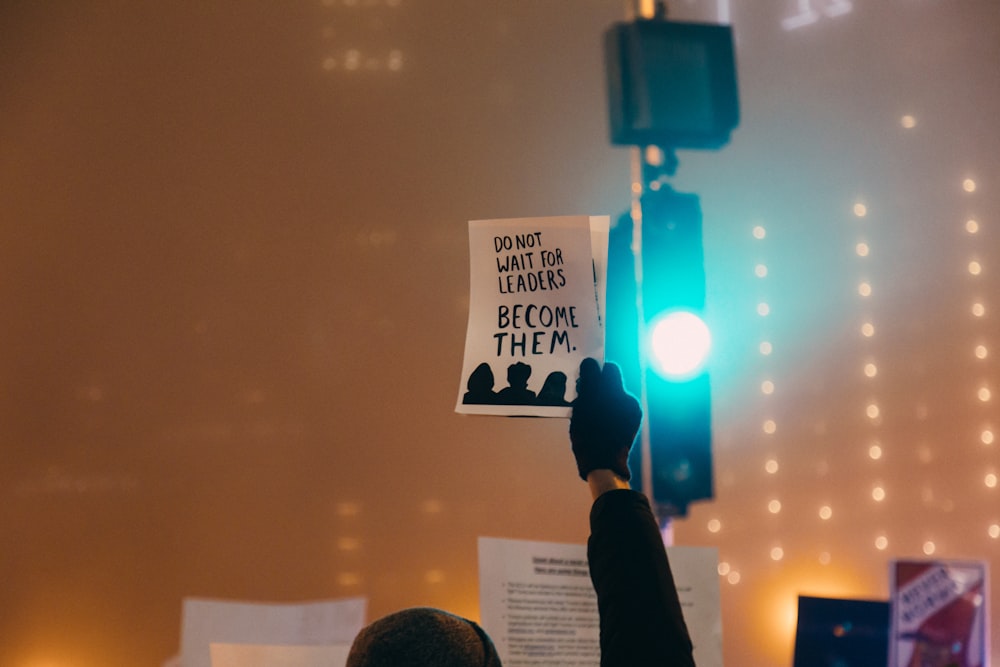 person hand holding paper