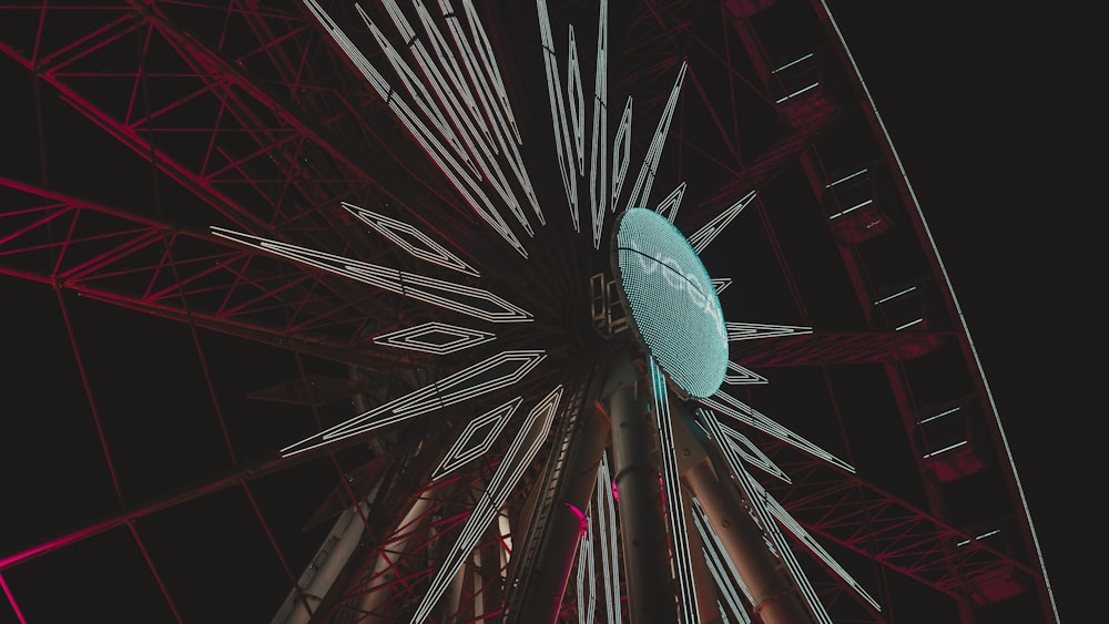 close up photo of Ferris wheel against black background