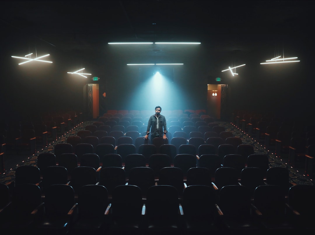 man standing in cinema