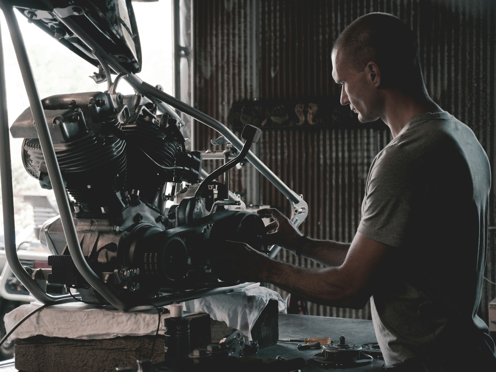 engineering examining an engine