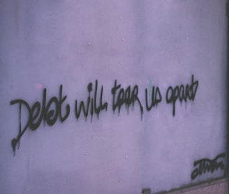 debt will tear us apart wall decor