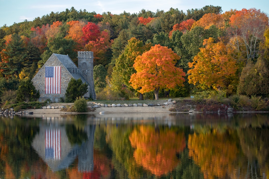 gray concrete castle near body of water