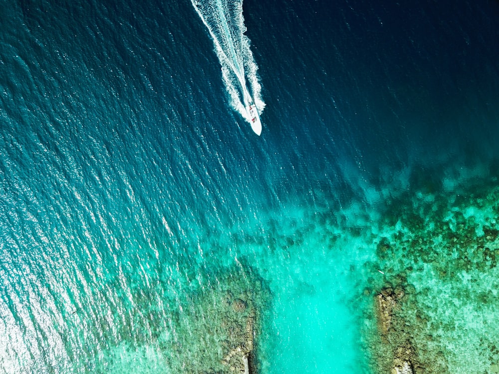 boat moving toward island