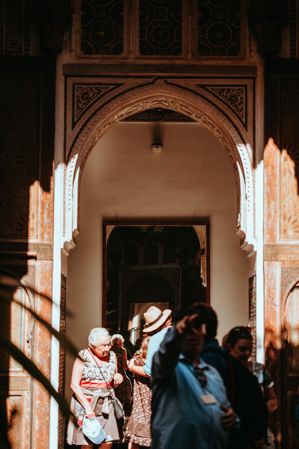 group of people standing inside house