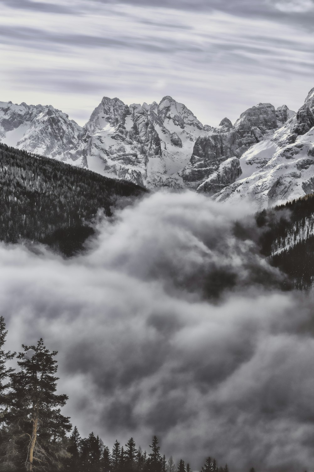 landscape photo of mountains covered by snows