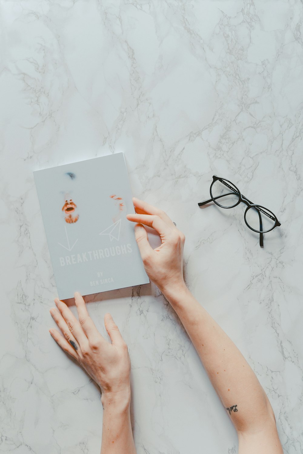 person holding book