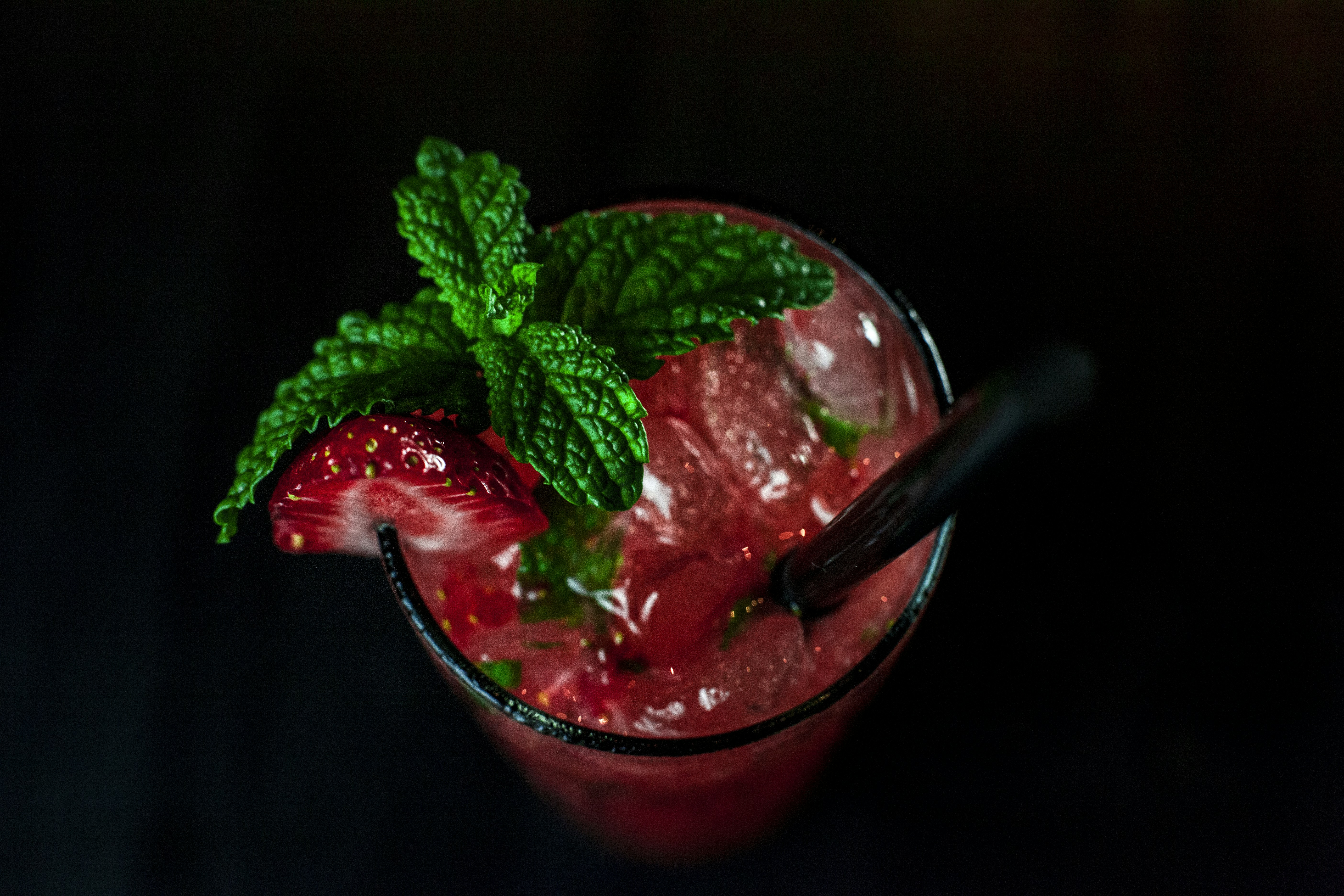 glass cup filled with strawberry drink