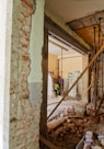 man climbing on ladder inside room