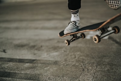 person jumping with skateboard skate teams background