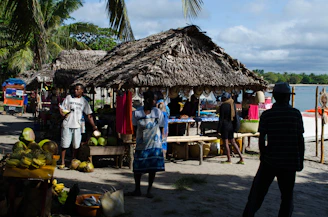 A vibrant market scene in Mauritius showcasing fresh local produce and friendly vendors.
