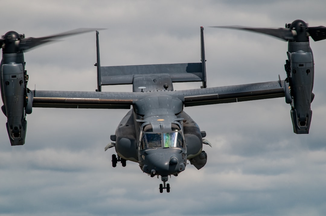 black helicopter carrier hovering on sky, Boeing Osprey