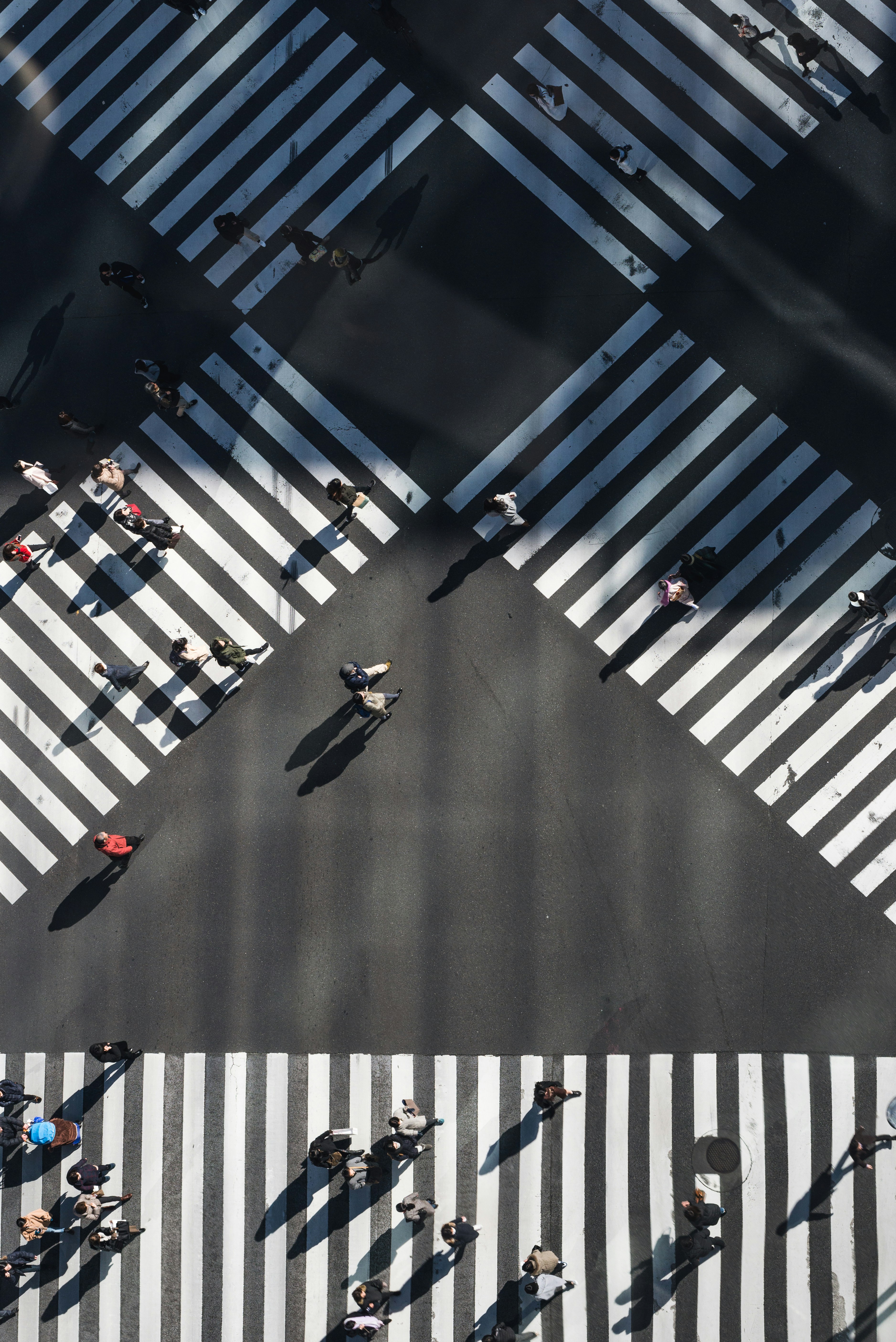 great photo recipe,how to photograph crossing; aerial photography of people walking in the intersection street during daytime