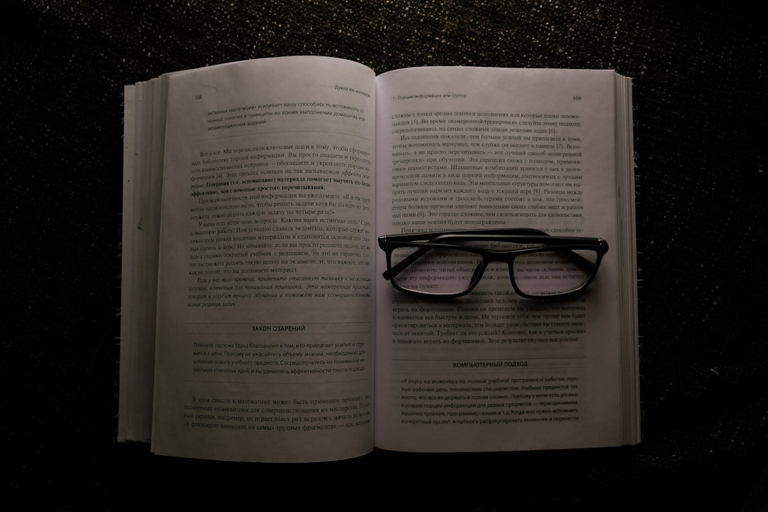 eyeglasses on white book