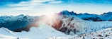 A panoramic view of the Cocuy National Park’s snow-capped peaks glowing warmly in the late afternoon light.