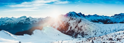 A panoramic view of the Cocuy National Park’s snow-capped peaks glowing warmly in the late afternoon light.