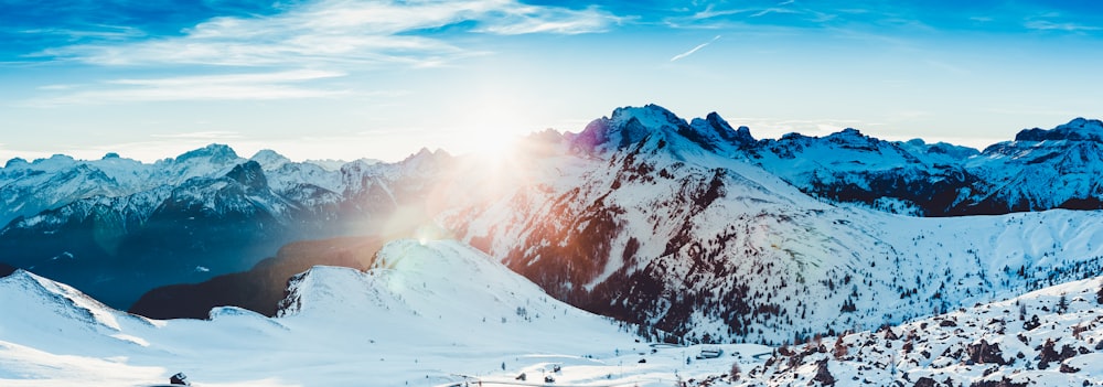 snow-covered mountain during daytime