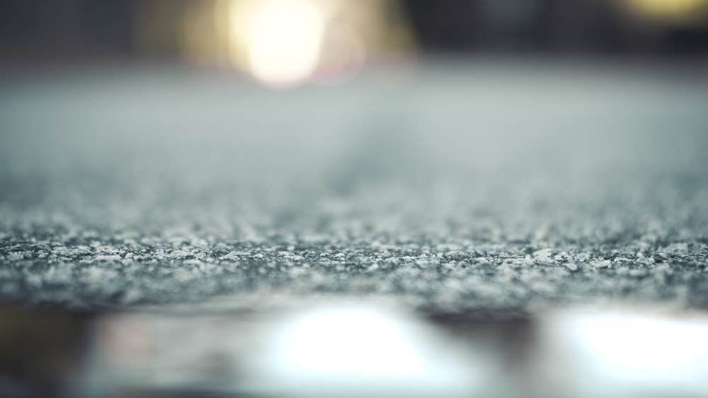 a close up of a surface with a blurry background