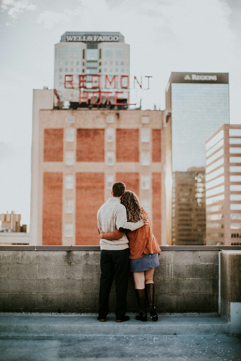 man and woman hugging each other