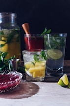 closeup photo of vodka with lemon in glass