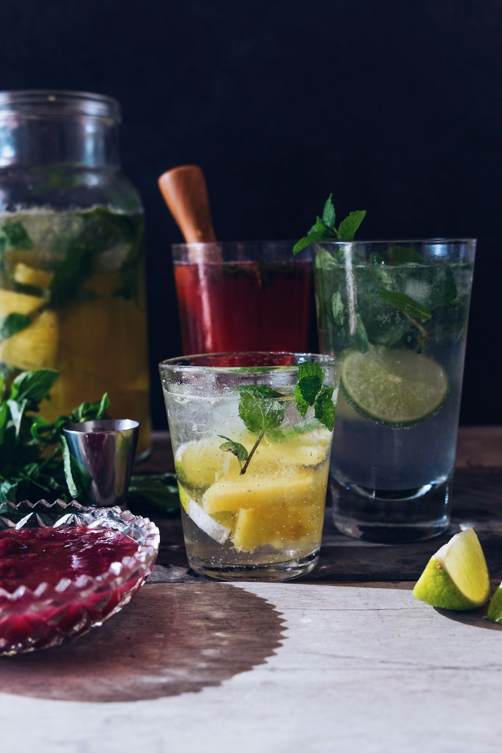 closeup photo of vodka with lemon in glass