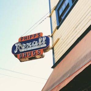 Close-up of a freshly installed storefront sign with vibrant colors in downtown Phoenix