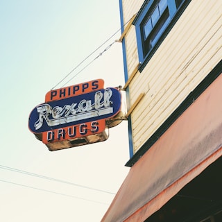 Close-up of a freshly installed storefront sign with vibrant colors in downtown Phoenix