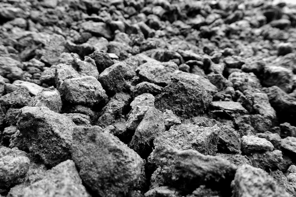 Close-up of raw limestone rocks freshly mined, showcasing their rough texture and natural colors.